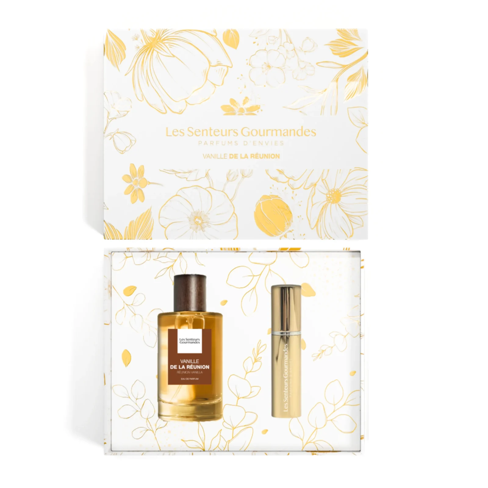 Vue du dessus du coffret cadeau ouvert Vanille de la Réunion de la marque Les Senteurs Gourmandes, incluant un flacon d'Eau de Parfum 100ml au jus ambré et un vaporisateur de sac doré, disposés dans un écrin blanc aux illustrations florales dorées.